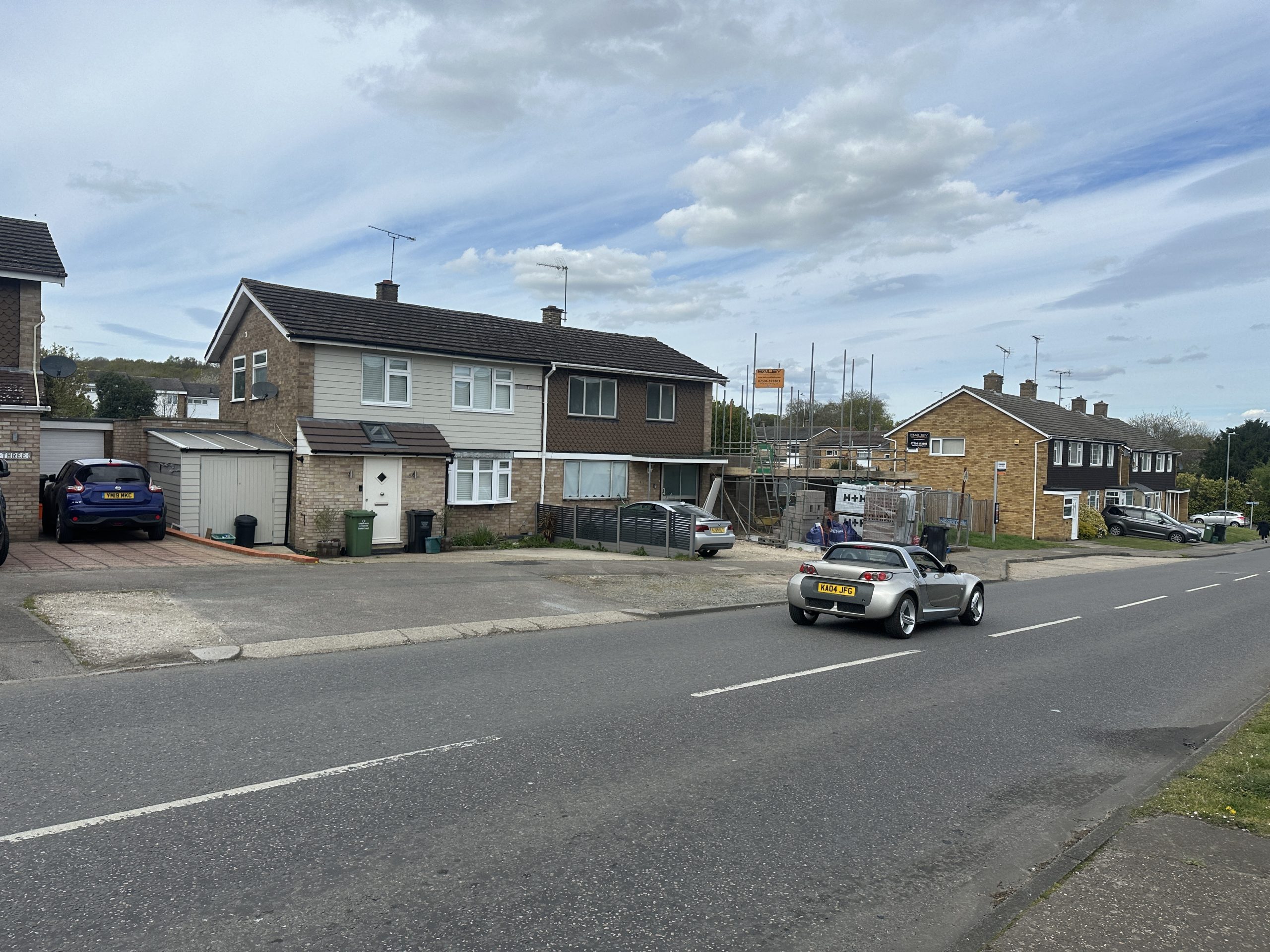 Outwood Common Road: street context showing a neighbouring plot under construction