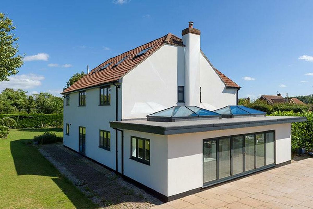 Rear extension with twin roof lanterns and full-width bifolds. Hockley, Essex
